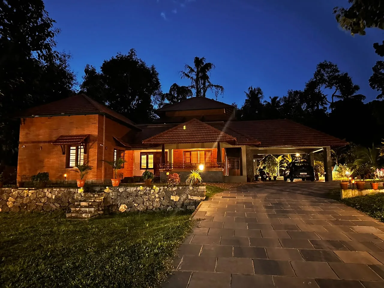 Indulekha & Roble Residence at dusk, Ettumanoor